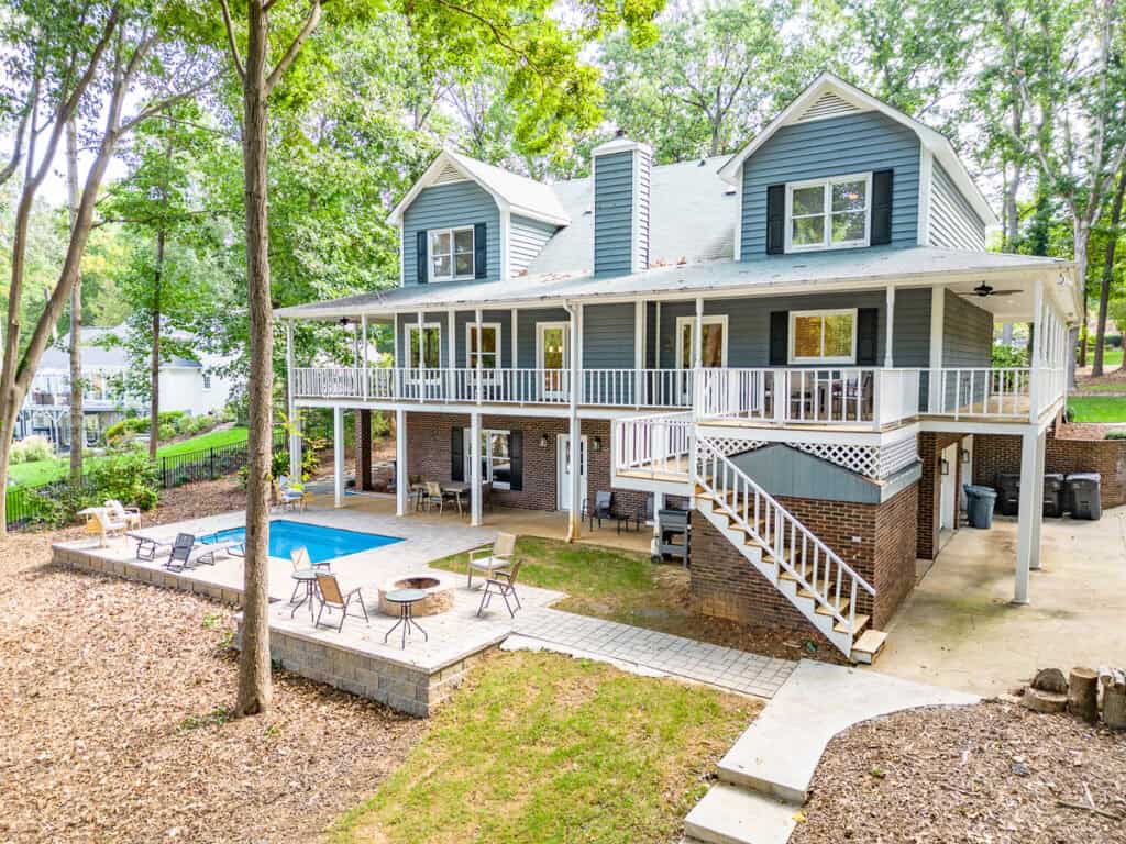a house with a pool in the back