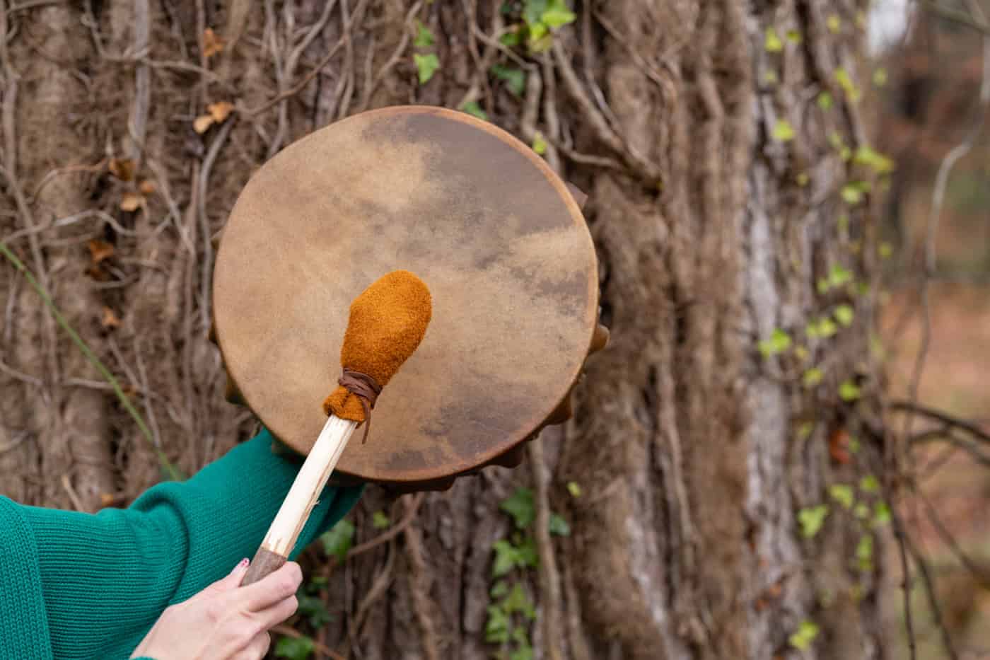 a person holding a drum